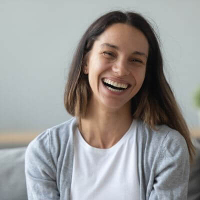 a woman smiling at camera